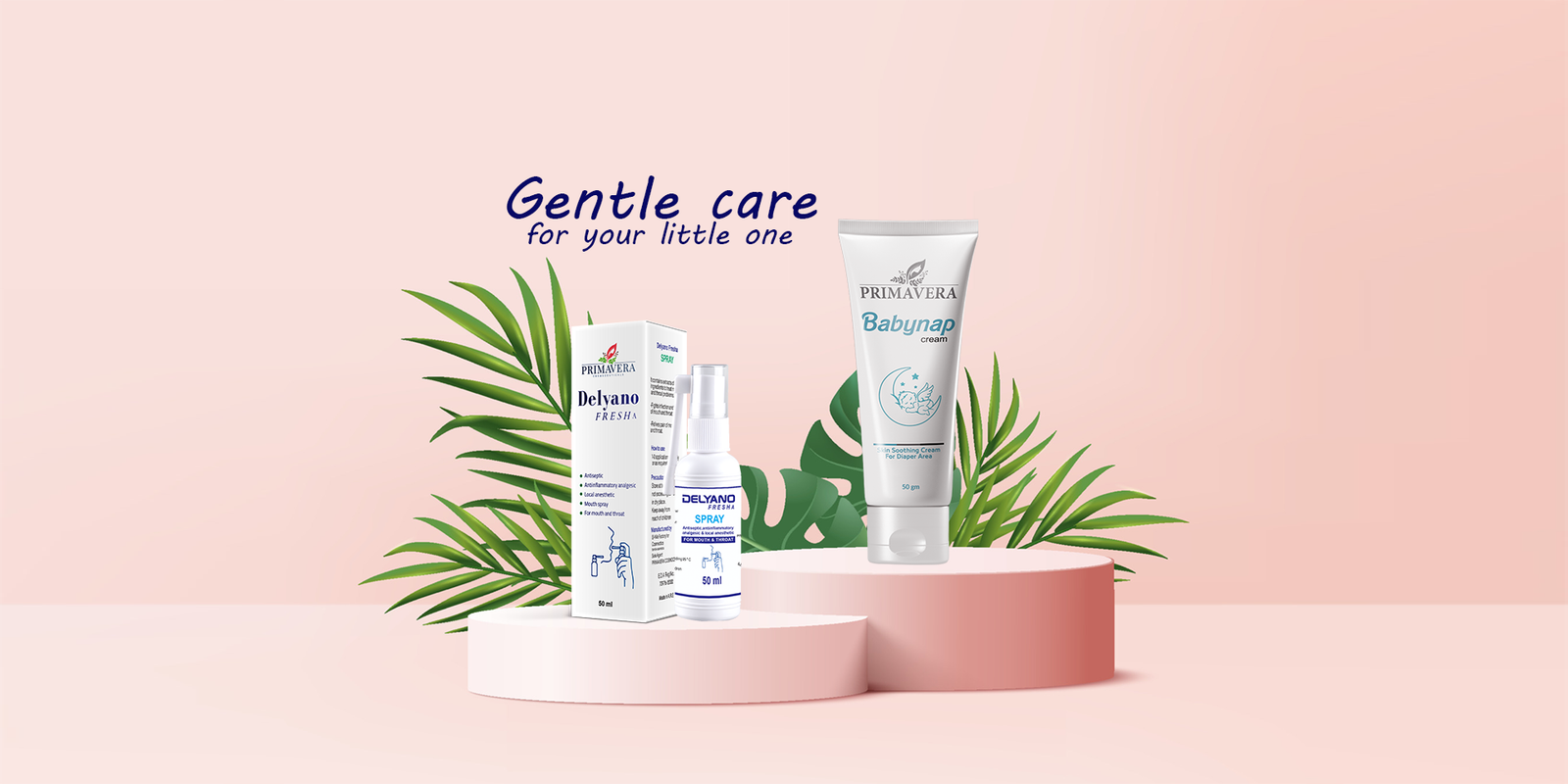 Baby skincare products on a pink platform with green leaves against a light pink background